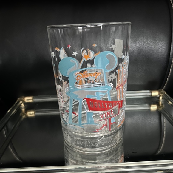 Walt Disney World Hollywood Studios MGM Glass Cup 25th Anniversary - Picture 1 of 4